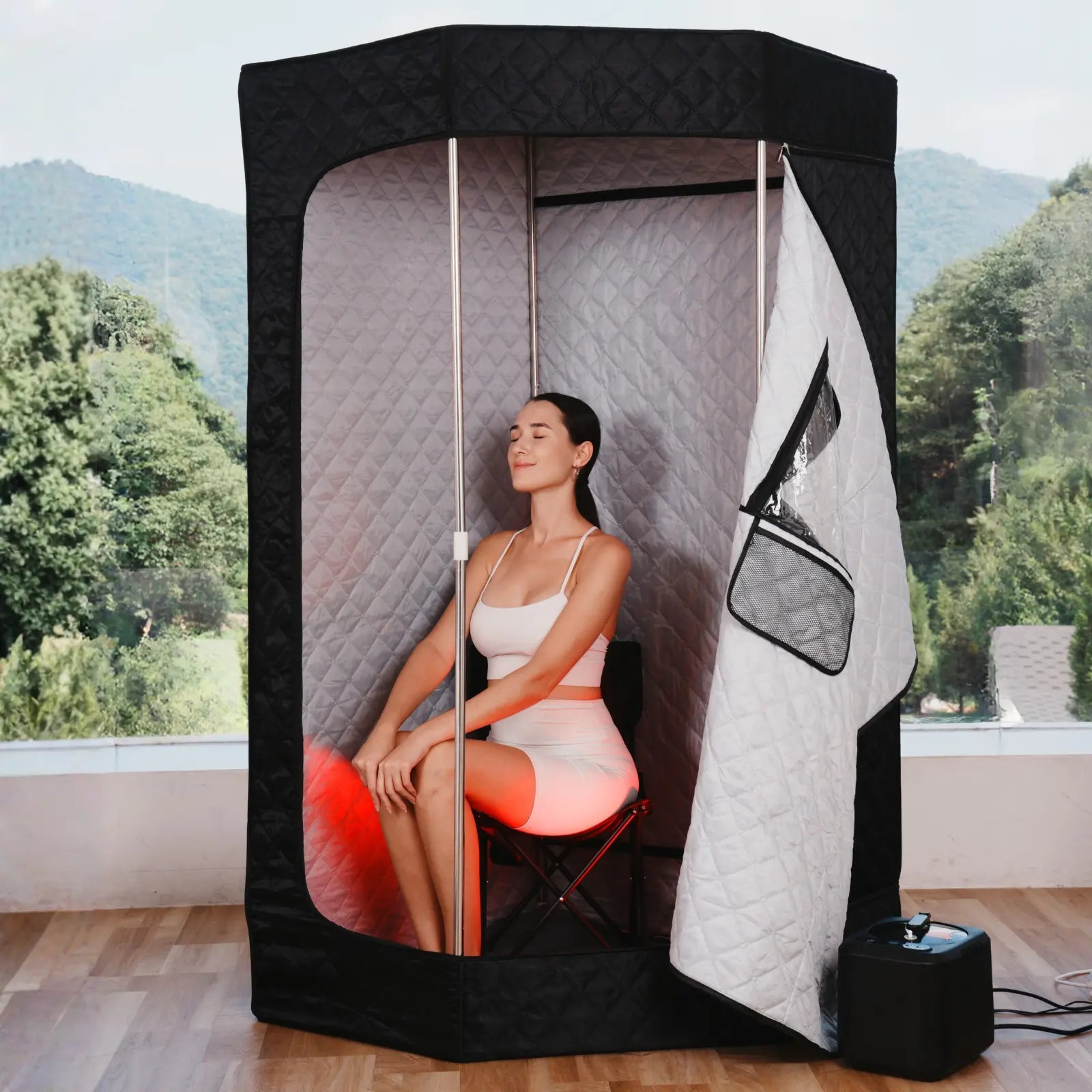 A woman is relaxing in the Lucears sauna and enjoying the steam