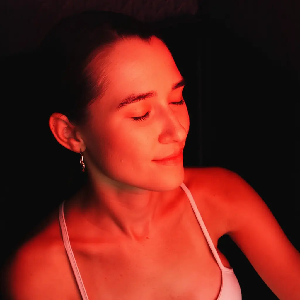 A beautiful woman sweats and detoxifies and relaxation in the lucears steam sauna